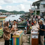 Dampak Kegiatan Ekonomi terhadap Kehidupan Sosial Masyarakat (AiStudio)